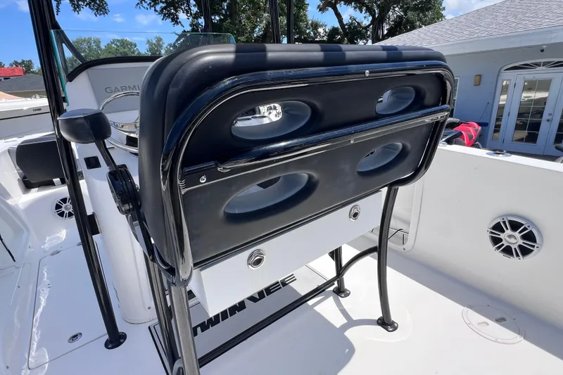 Slide: The Image of 2023 Twin Vee 240 GFX CC boat interior with seating and console details. - 19