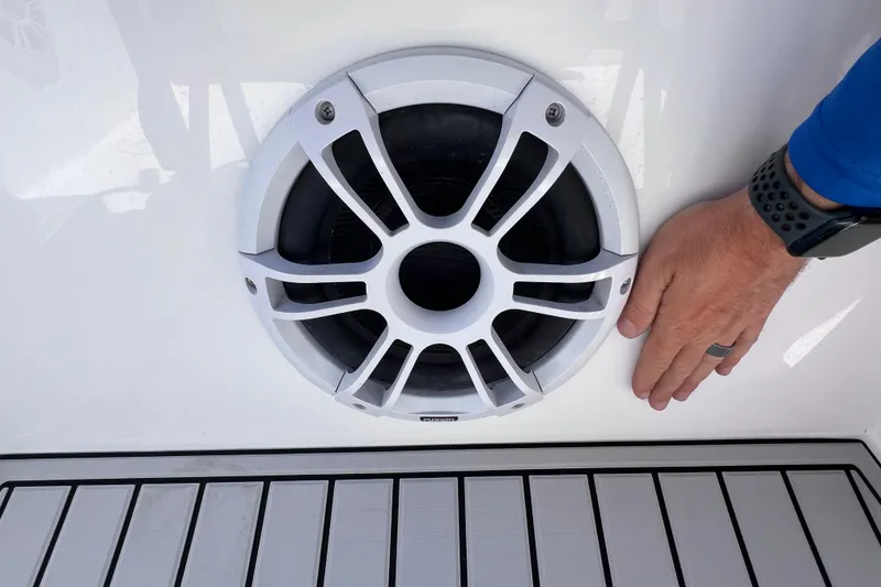Slide: The Image of Close-up of a speaker on a 2023 Twin Vee 240 GFX CC boat deck. - 29
