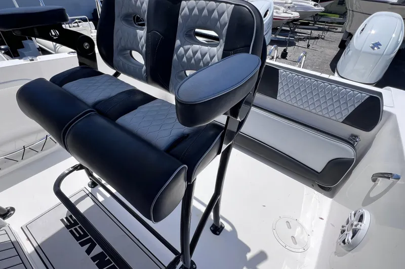 Slide: The Image of 2023 Twin Vee 240 GFX CC boat interior with stylish seating and modern design. - 30