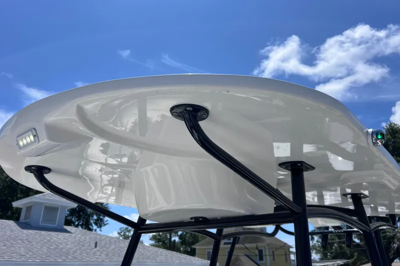 Slide: The Image of 2023 Twin Vee 240 GFX CC boat canopy with sleek design and integrated lighting. - 35