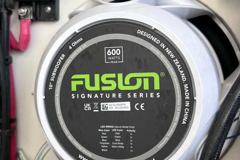 Slide: The Image of Fusion Signature Series 10" subwoofer, 600 watts peak, installed on 2023 Twin Vee 240 GFX CC. - 48