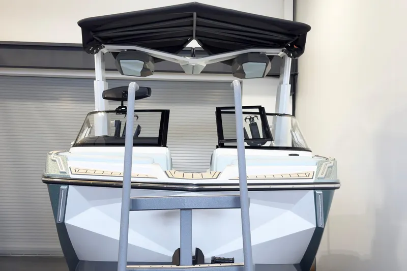 Slide: The Image of 2020 Nautique Super Air Nautique G23 Paragon boat in showroom, front view. - 3