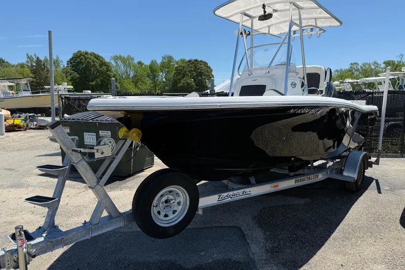 The Image of 2024 Tidewater 198 CC Adventure boat on trailer, parked outdoors. - 10