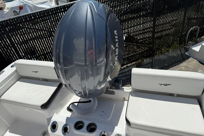 Slide: The Image of 2024 Tidewater 198 CC Adventure boat with Yamaha outboard motor, featuring sleek seating design. - 16
