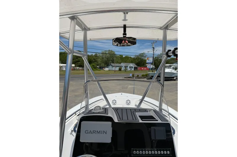 Slide: The Image of 2024 Tidewater 198 CC Adventure boat dashboard with Garmin navigation system. - 17
