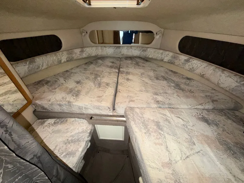 Slide: The Image of Interior of 1996 Sea Ray 290 Sundancer with sleeping area. - 18