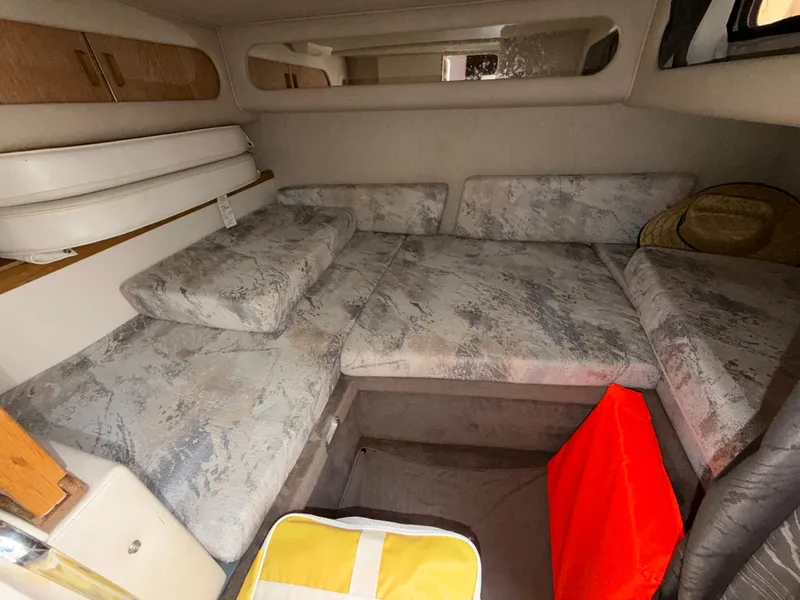 Slide: The Image of Interior of 1996 Sea Ray 290 Sundancer with sleeping area. - 22