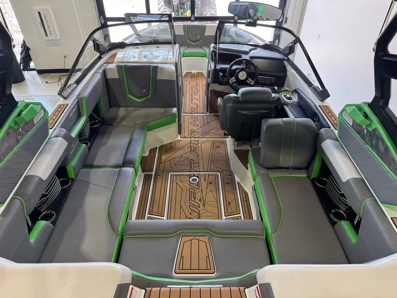 Slide: The Image of Interior of a 2019 Nautique Super Air Nautique G21 boat with modern seating. - 13