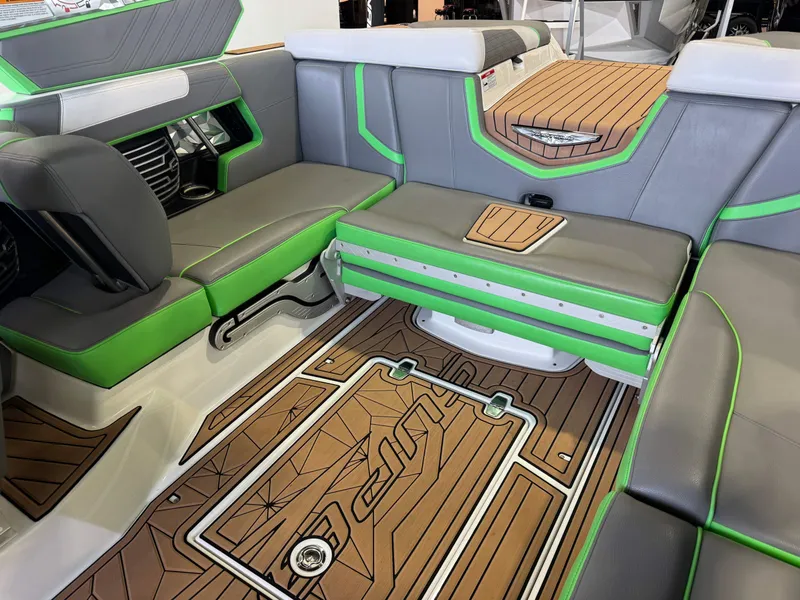 Slide: The Image of 2019 Nautique Super Air G21 interior with green accents. - 15