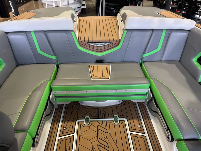 Slide: The Image of Interior of 2019 Nautique Super Air Nautique G21 with gray and green seating. - 27