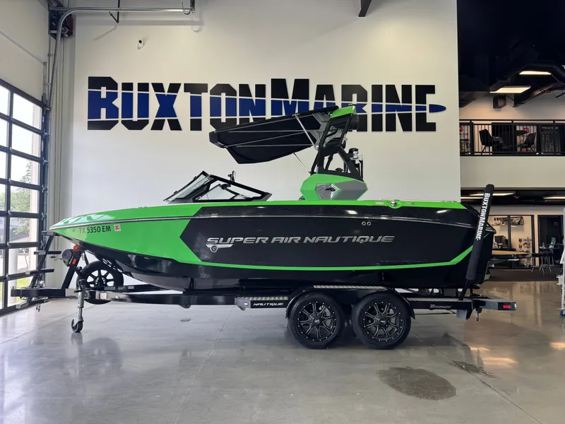 Slide: The Image of 2019 Nautique Super Air Nautique G21 boat in green design at Buxton Marine. - 4