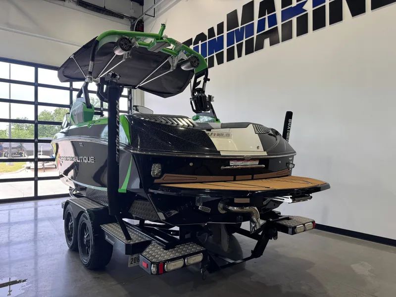 Slide: The Image of 2019 Nautique Super Air Nautique G21 boat in showroom. - 5