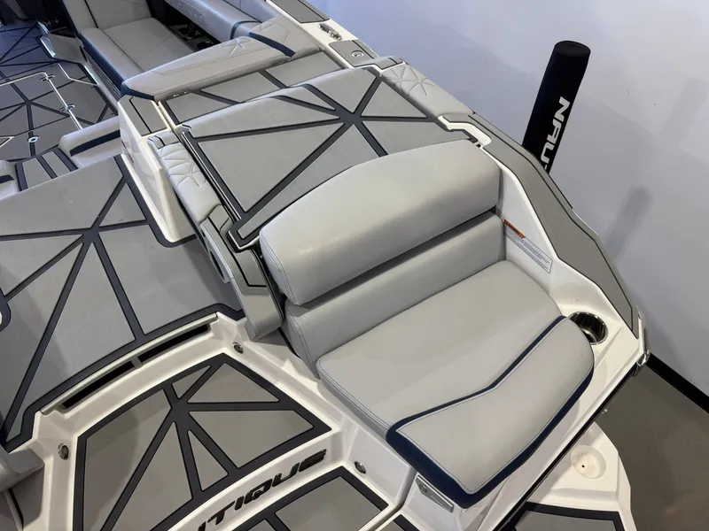 Slide: The Image of 2024 Nautique Super Air G25 Paragon boat seat with gray upholstery. - 11