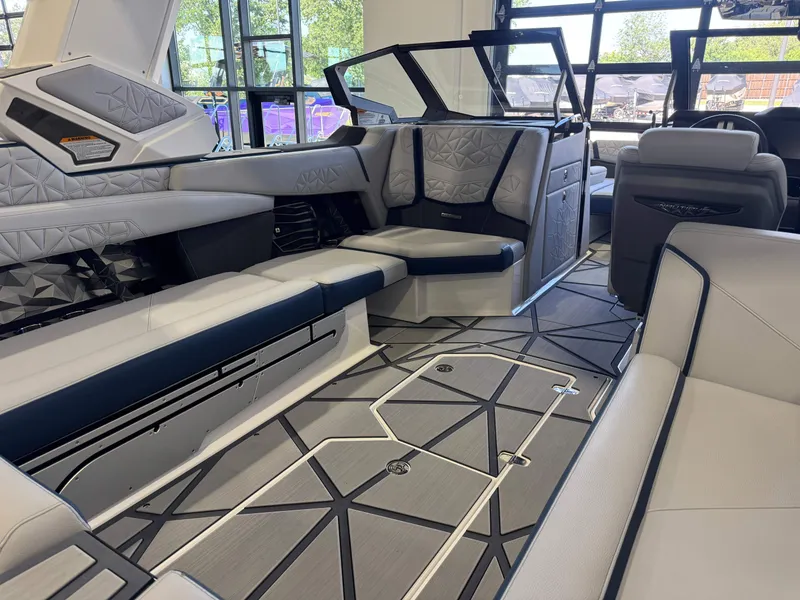 Slide: The Image of Interior of the 2024 Nautique Super Air Nautique G25 Paragon boat. - 17