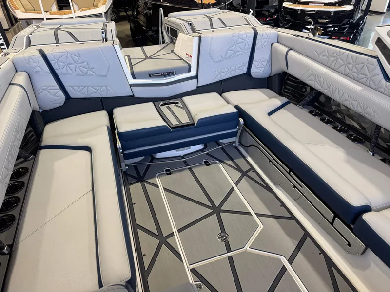 Slide: The Image of Interior of 2024 Nautique Super Air Nautique G25 Paragon with luxurious seating. - 19