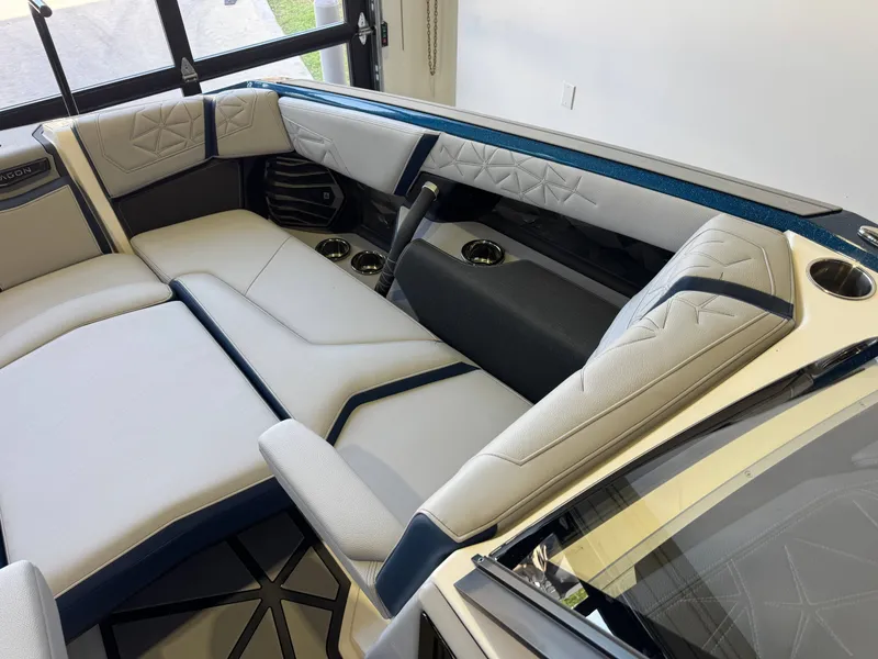 Slide: The Image of Interior of 2024 Nautique Super Air Nautique G25 Paragon with luxurious seating. - 21