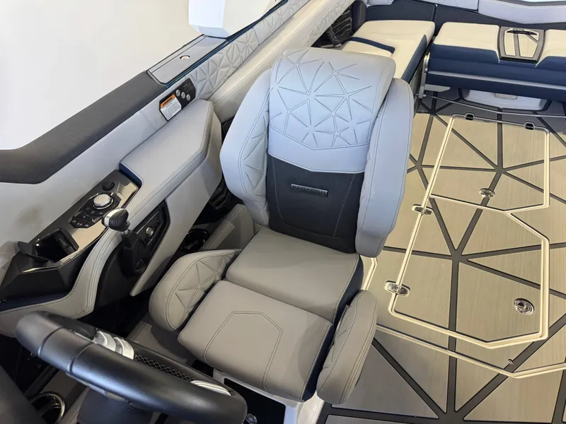 Slide: The Image of Interior of 2024 Nautique Super Air Nautique G25 Paragon with luxurious seating. - 24