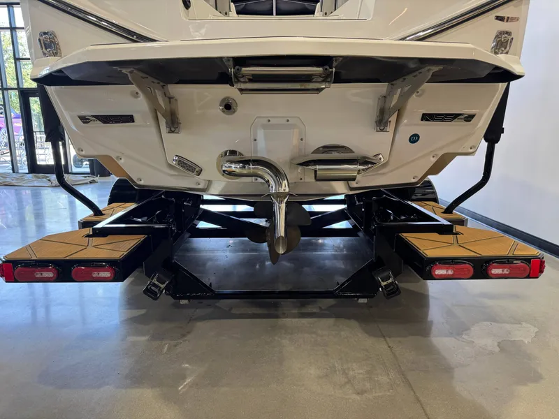 Slide: The Image of Rear view of 2024 Nautique Super Air Nautique G25 Paragon boat. - 7