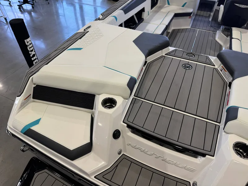 Slide: The Image of Interior of the Nautique Super Air Nautique GS22 with white and gray upholstery. - 12