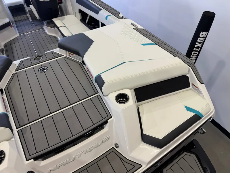 Slide: The Image of The image shows the stern of a Nautique Super Air Nautique GS22 with sleek seating. - 11