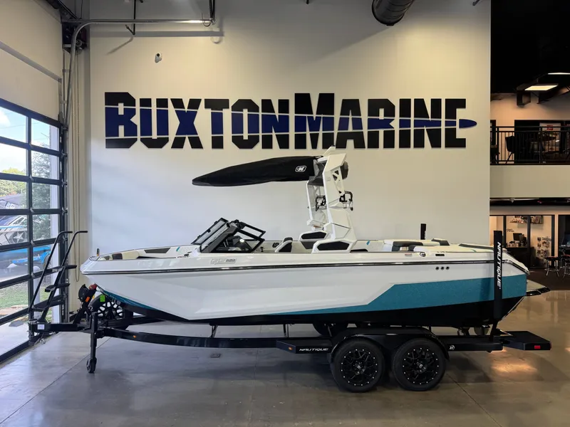 The Image of 2026 Nautique Super Air Nautique GS22 in a showroom. - 1