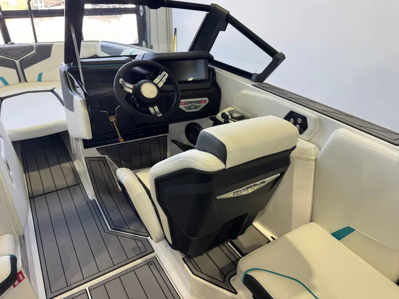 Slide: The Image of Interior of a modern boat with white seats and gray flooring. - 24