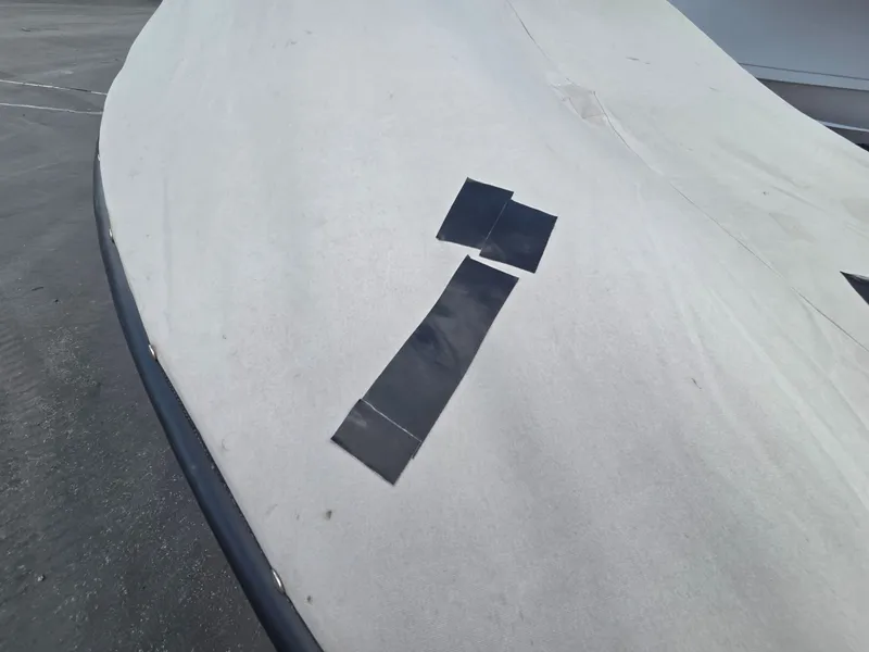Slide: The Image of Covered boat, Crestliner CMV 1750, 2004 model, with black tape. - 10