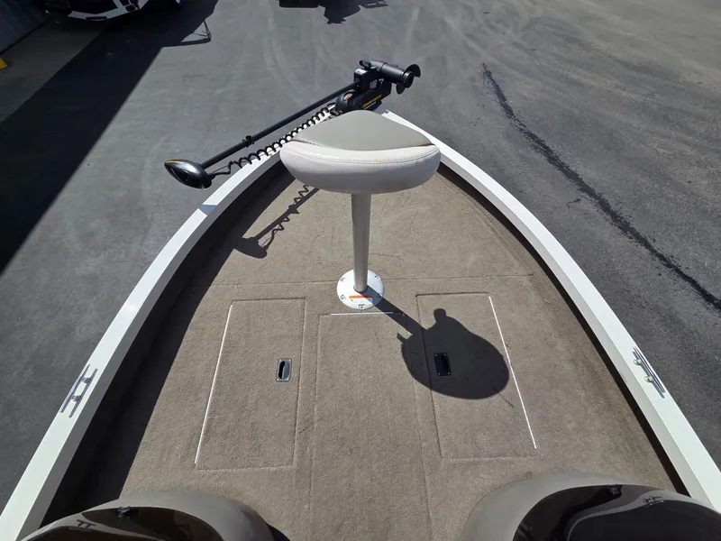 Slide: The Image of 2004 Crestliner CMV 1750 boat with seat and controls. - 13