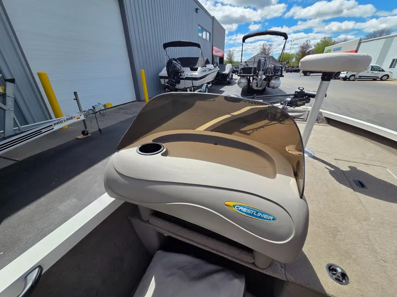 Slide: The Image of 2004 Crestliner CMV 1750 boat outdoors in sunny weather. - 18
