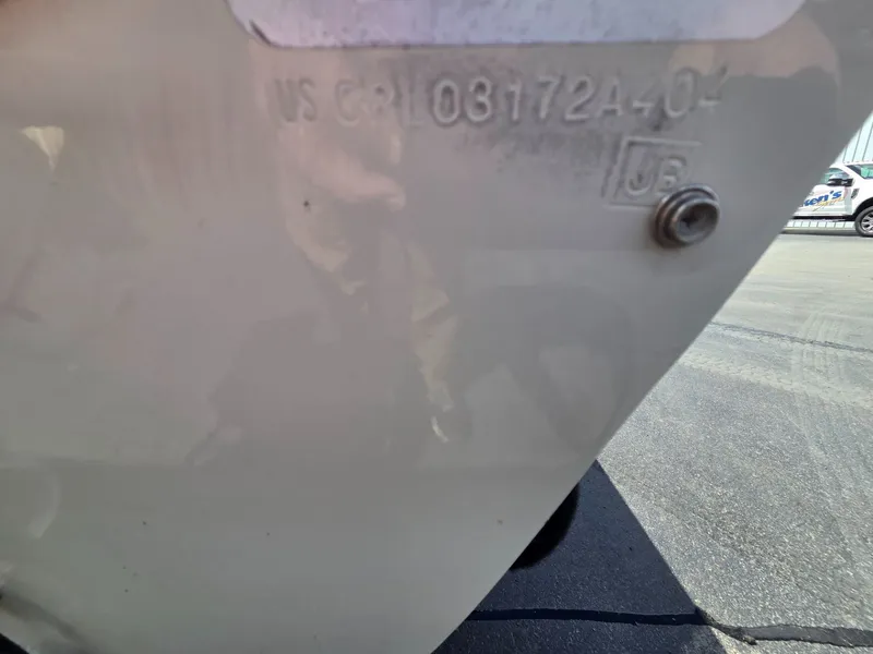 Slide: The Image of Close-up of serial number on a 2004 Crestliner CMV 1750 boat. - 25