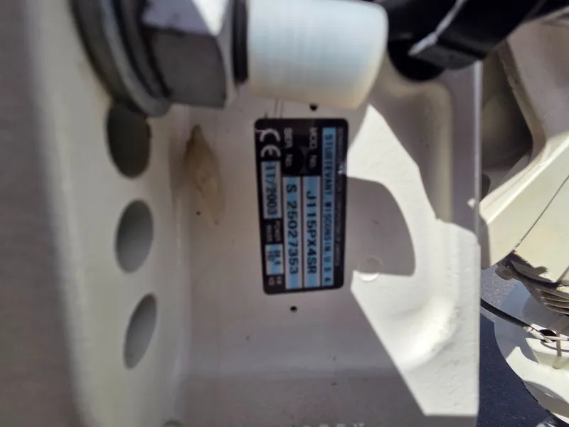 Slide: The Image of Close-up of a 2004 Crestliner CMV 1750 boat label. - 26