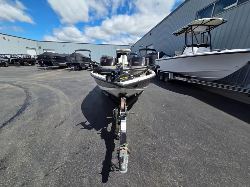 Slide: The Image of 2004 Crestliner CMV 1750 boat on trailer outdoors. - 3