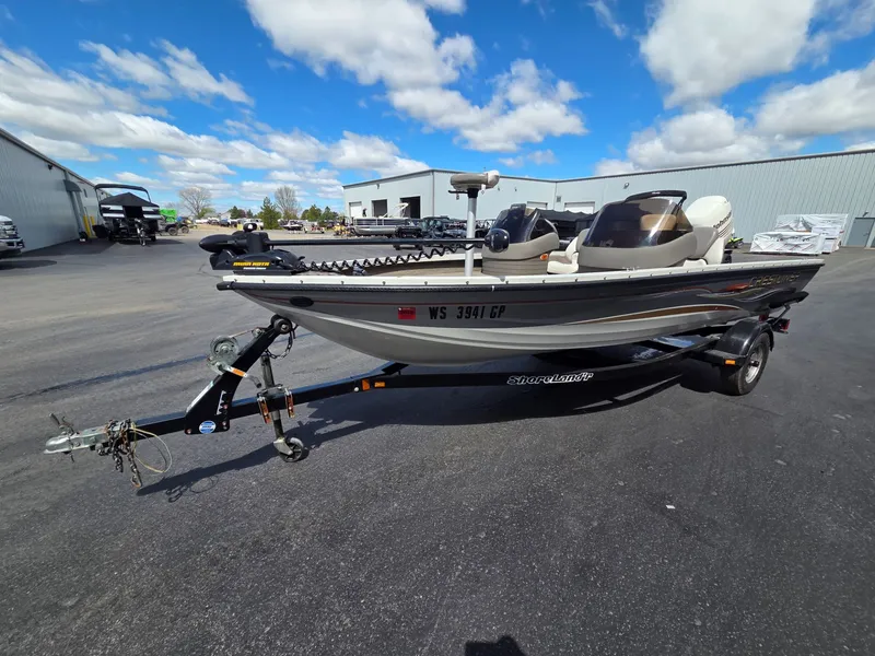 Slide: The Image of 2004 Crestliner CMV 1750 boat on trailer, blue sky. - 4