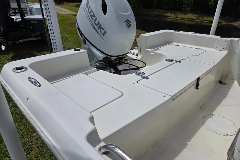 Slide: The Image of Bulls Bay 2000 boat, 2022 model, featuring a Suzuki outboard motor, white deck layout. - 10