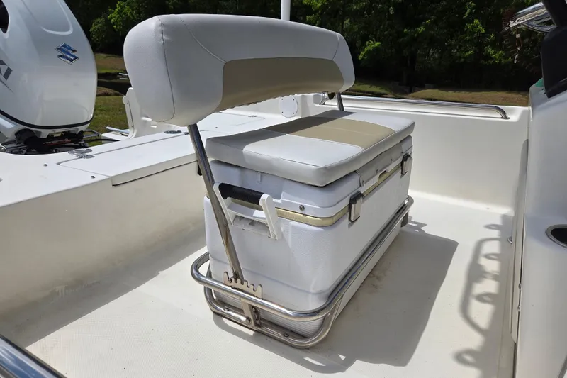 Slide: The Image of Bulls Bay 2000 boat seat with cooler, 2022 model, featuring Suzuki engine. - 12