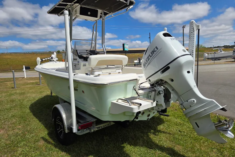 Slide: The Image of 2022 Bulls Bay 2000 boat with Suzuki outboard motor on a trailer. - 4