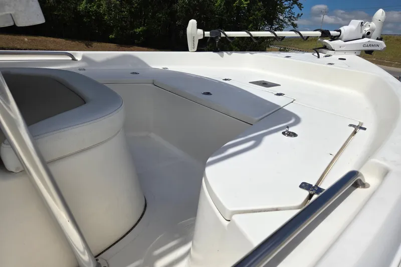 Slide: The Image of 2022 Bulls Bay 2000 boat interior with seating and Garmin equipment, showcasing sleek design. - 8