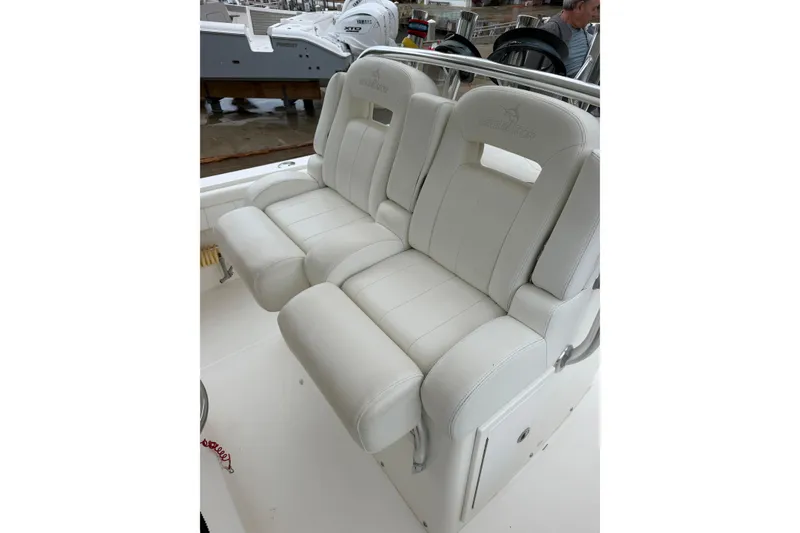 Slide: The Image of White leather seating on a 2018 Regulator 31 boat, showcasing comfort and style. - 17