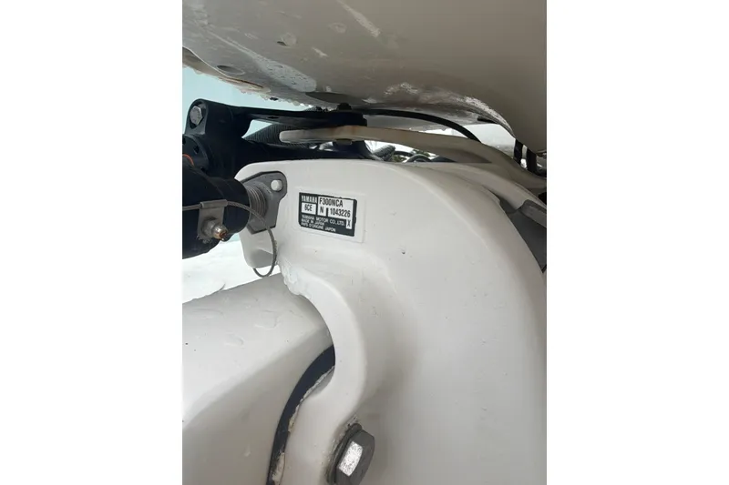 Slide: The Image of Close-up of a Yamaha F300NCA engine on a 2018 Regulator 31 boat. - 30