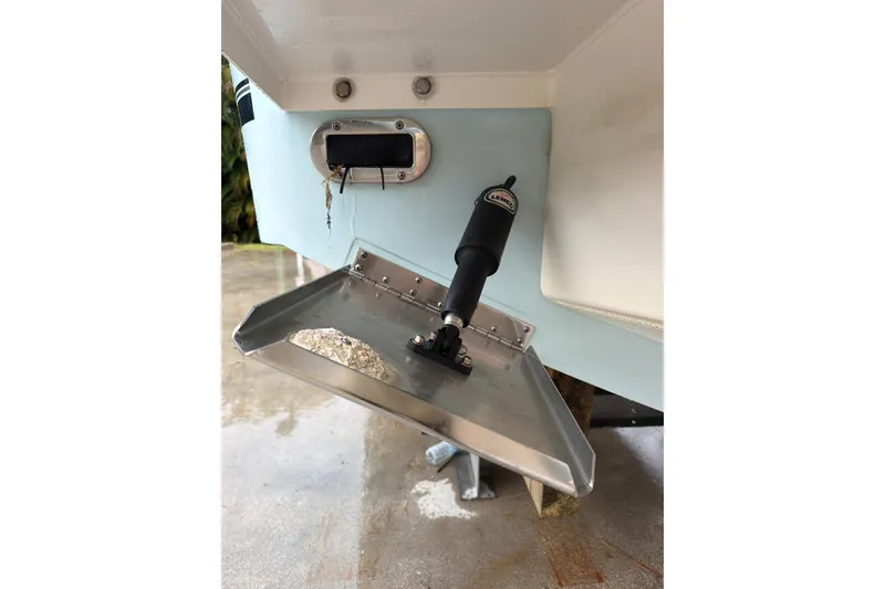 Slide: The Image of 2018 Regulator 31 boat trim tab and actuator detail. - 31