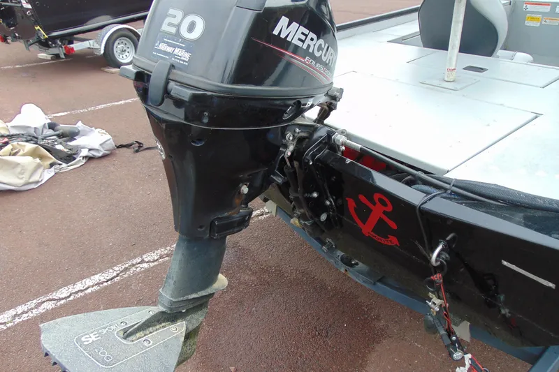 Slide: The Image of 2016 Crestliner 1600 Storm Poly boat with Mercury 20 HP outboard motor. - 5