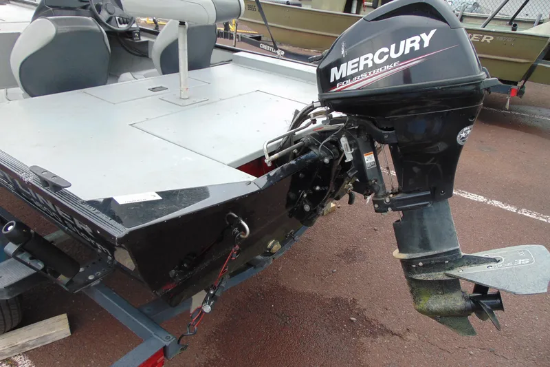Slide: The Image of 2016 Crestliner 1600 Storm Poly boat with Mercury FourStroke outboard motor. - 6