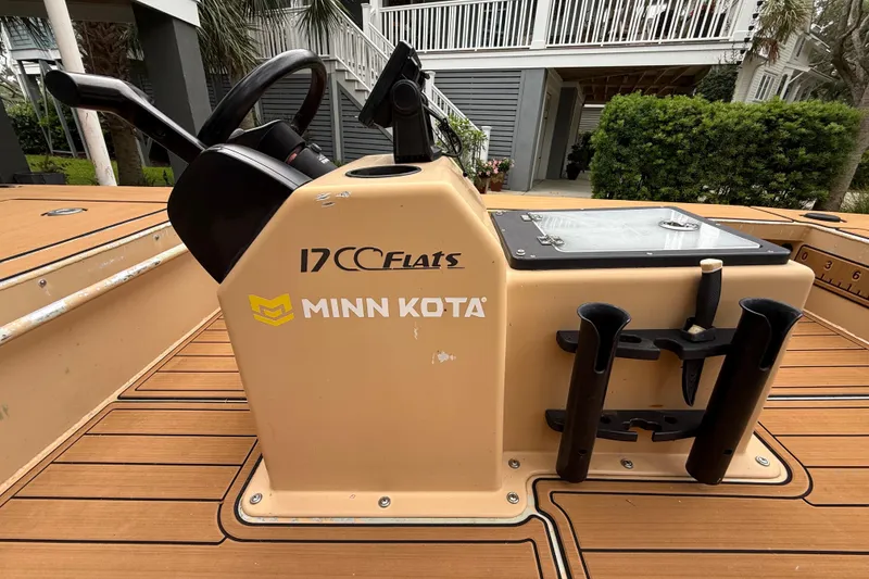 Slide: The Image of Center console of 2018 Cast and Blast 17CC boat with Minn Kota branding. - 16