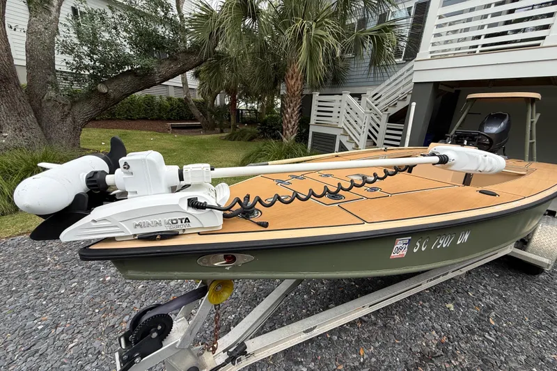 Slide: The Image of 2018 Cast and Blast 17CC boat with Minn Kota motor on trailer. - 2
