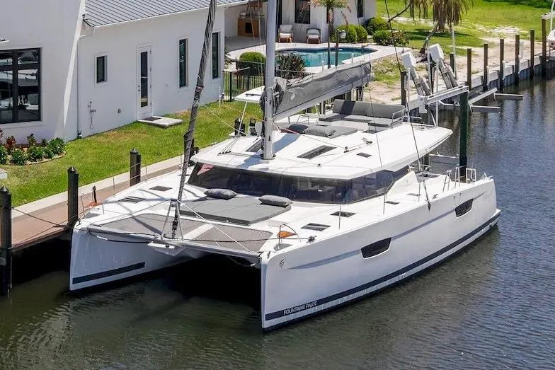 The Image of 2020 Fountaine Pajot Saona 47 catamaran docked at marina. - 0