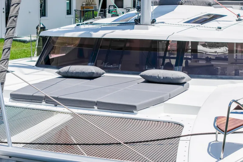 Slide: The Image of Luxurious 2020 Fountaine Pajot Saona 47 catamaran with sunbathing cushions on deck. - 12