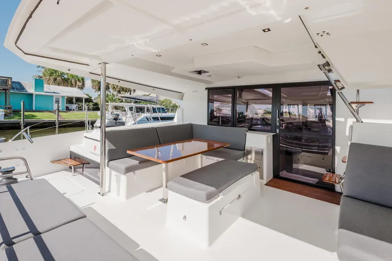 Slide: The Image of Spacious interior of 2020 Fountaine Pajot Saona 47 catamaran with modern seating and dining area. - 15