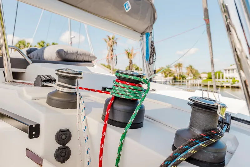 Slide: The Image of Deck view of 2020 Fountaine Pajot Saona 47 catamaran with colorful ropes and winches. - 28