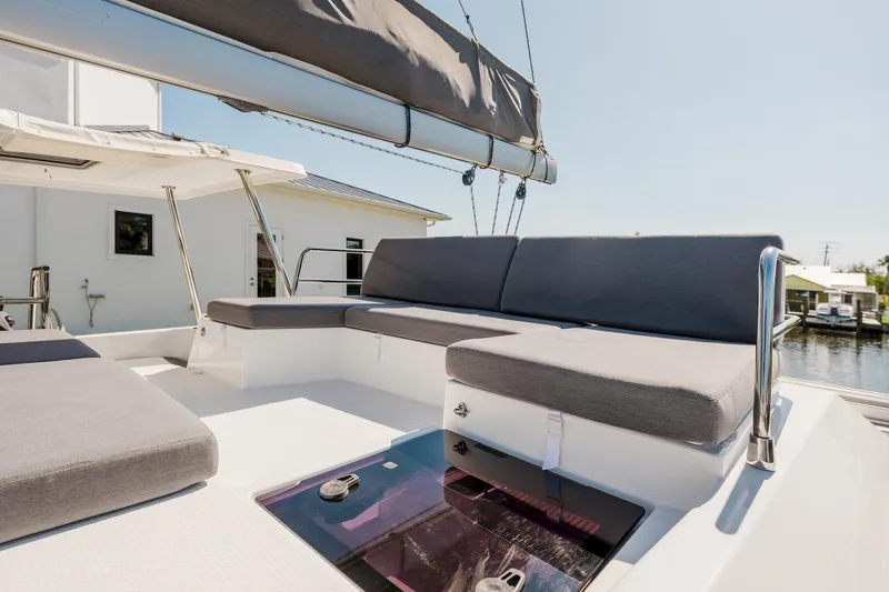 Slide: The Image of 2020 Fountaine Pajot Saona 47 catamaran with spacious outdoor seating area. - 29