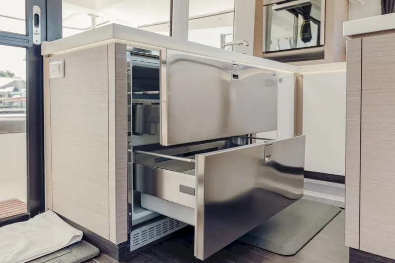Slide: The Image of Modern kitchen drawers in 2020 Fountaine Pajot Saona 47 yacht interior. - 44